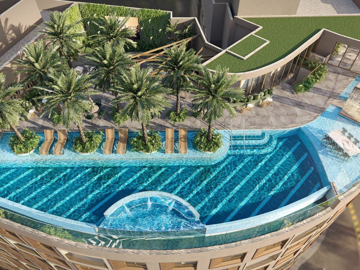 Piscina de borda infinita e solário no topo do edifício